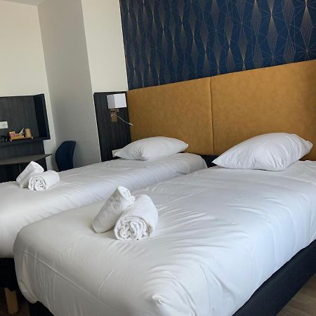 Hotel Le Cosy Riva Bella Ouistreham Bagian luar foto