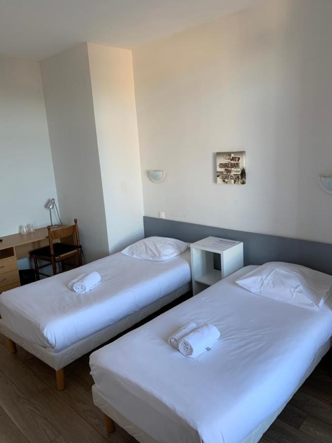 Hotel Le Cosy Riva Bella Ouistreham Bagian luar foto