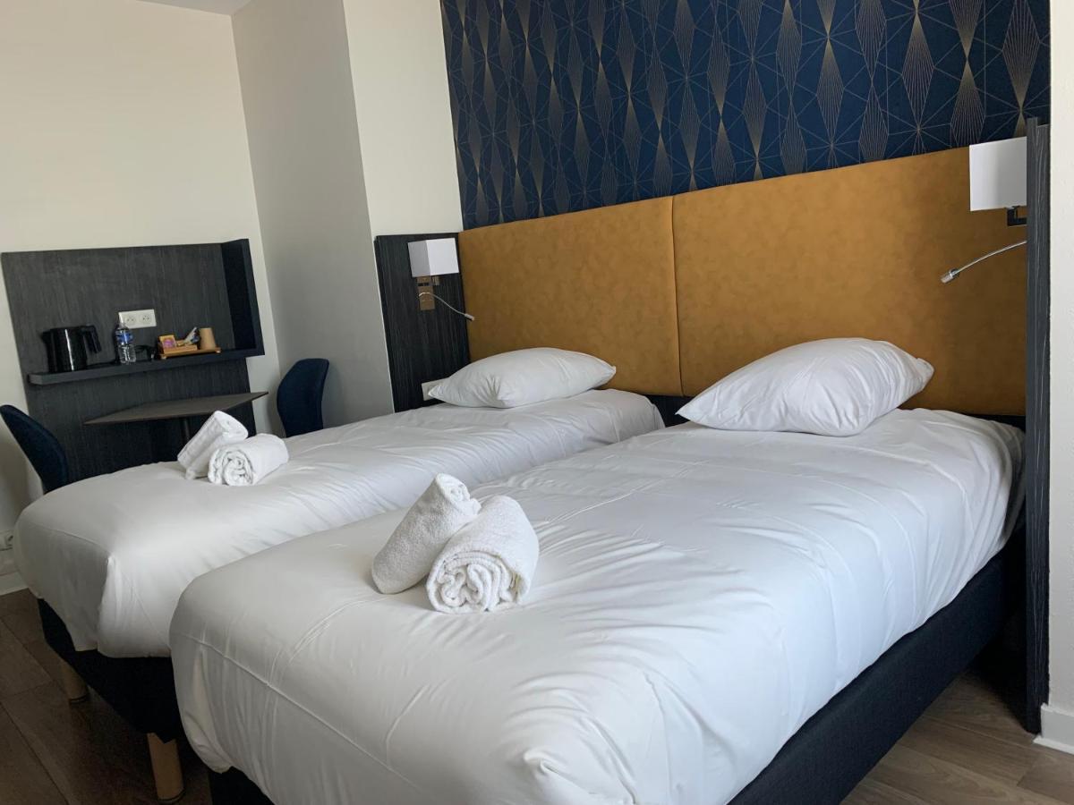 Hotel Le Cosy Riva Bella Ouistreham Bagian luar foto