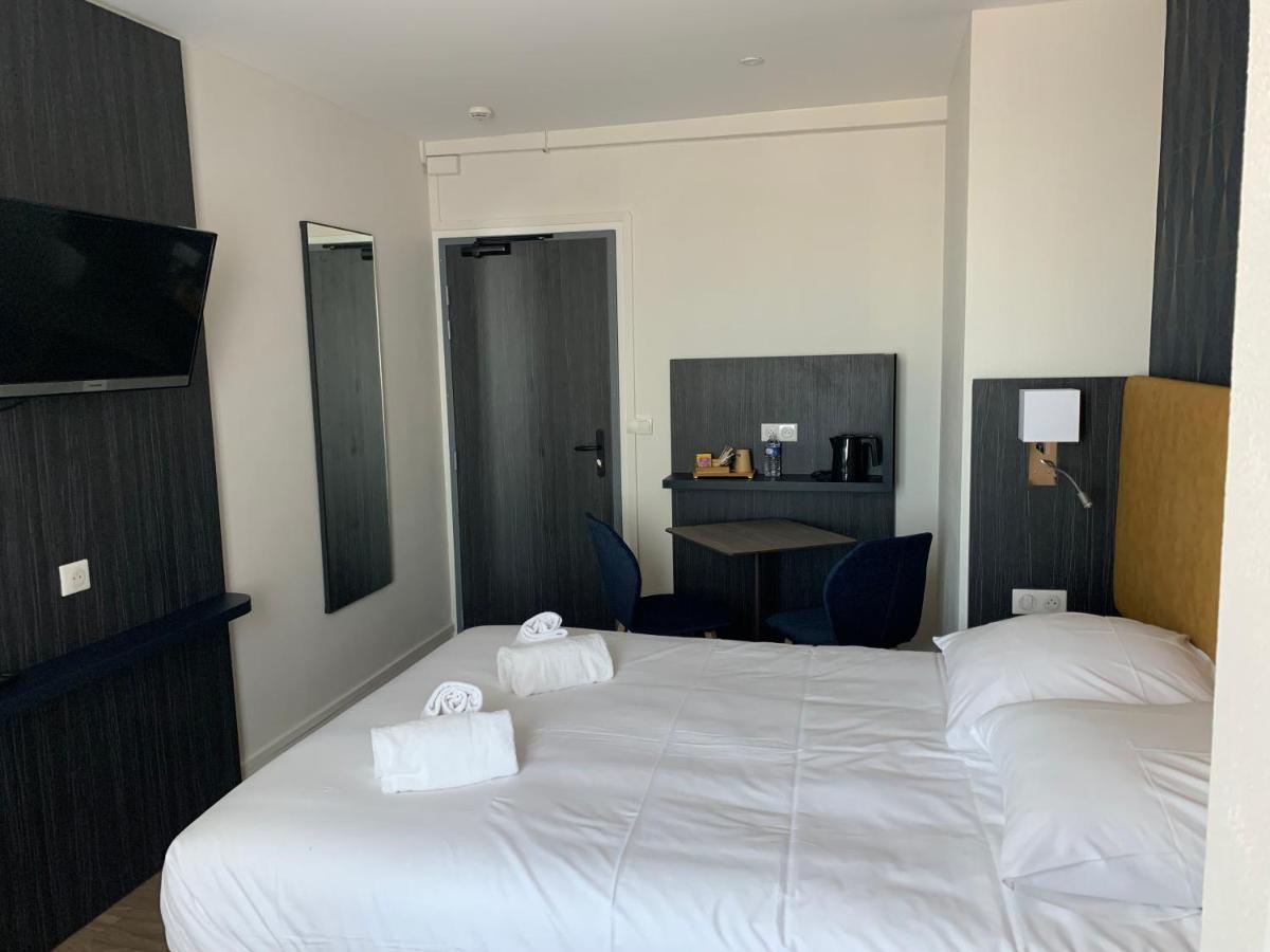 Hotel Le Cosy Riva Bella Ouistreham Bagian luar foto