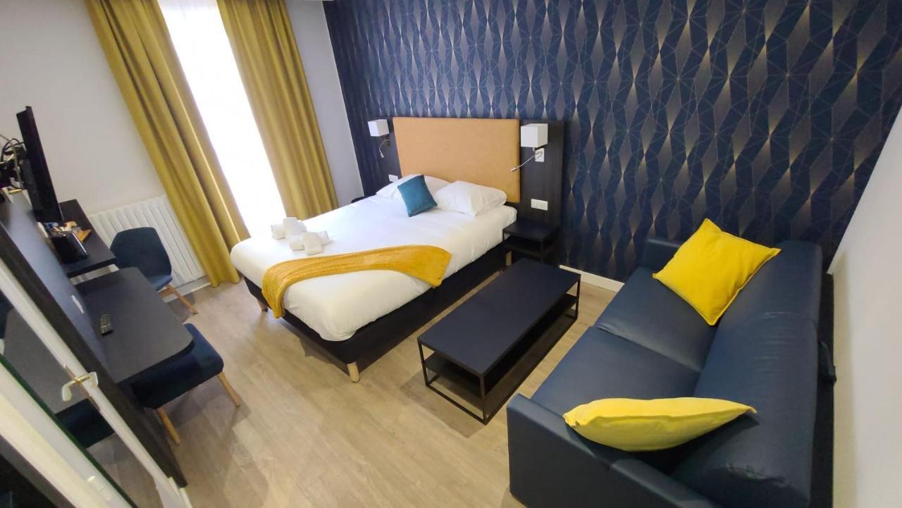Hotel Le Cosy Riva Bella Ouistreham Bagian luar foto