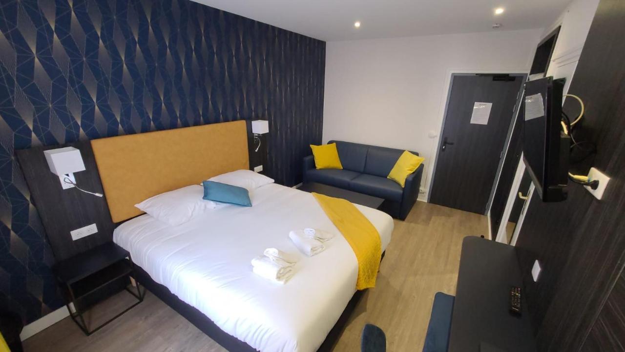 Hotel Le Cosy Riva Bella Ouistreham Bagian luar foto