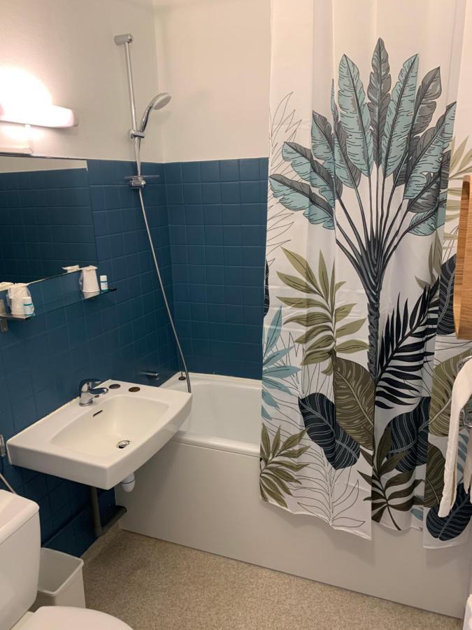 Hotel Le Cosy Riva Bella Ouistreham Bagian luar foto